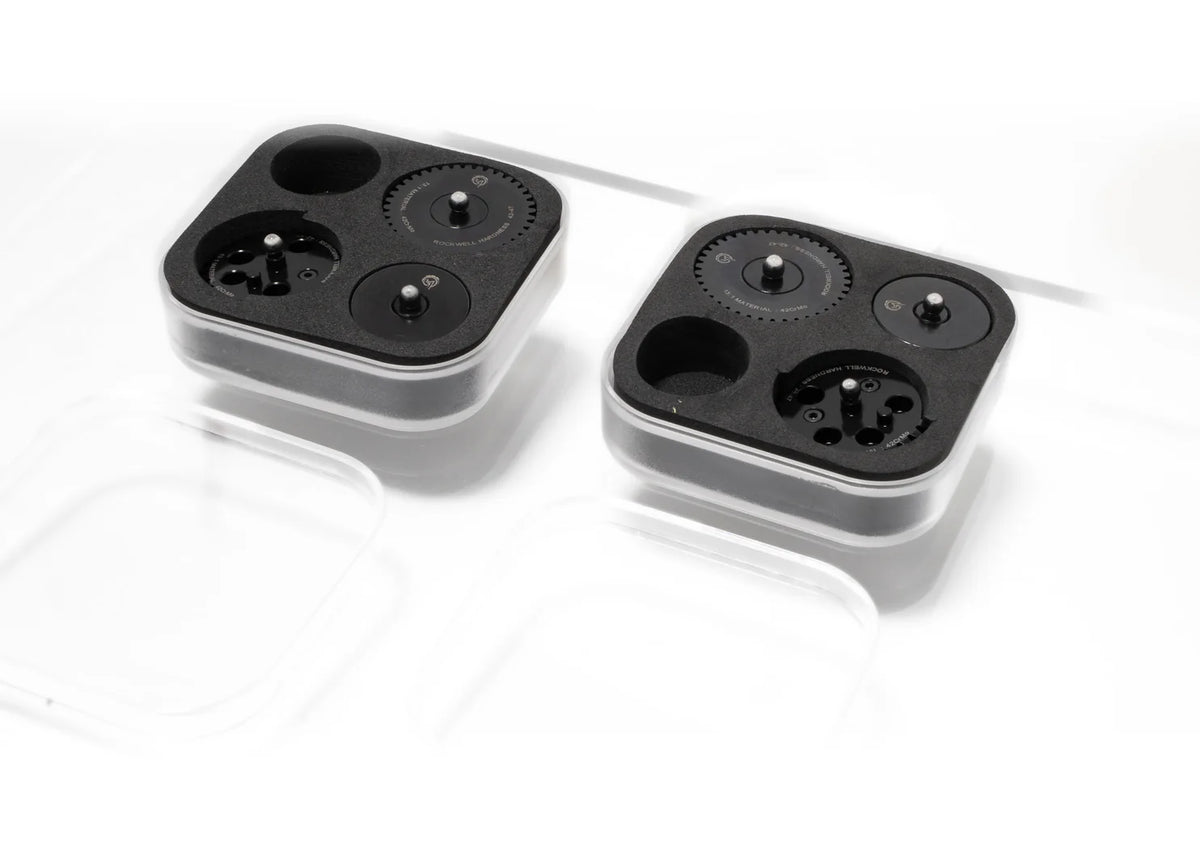 Two JVAN AEG gear sets in foam packaging on a white background