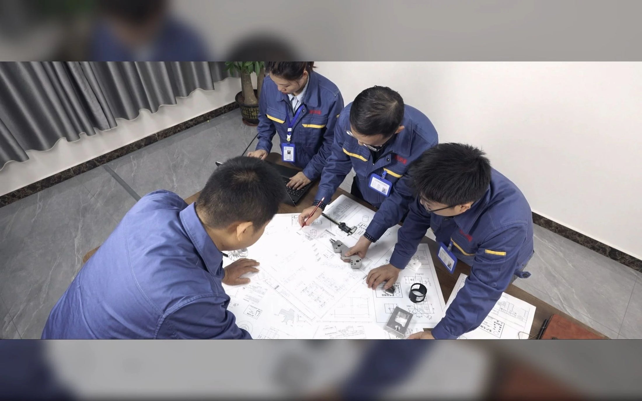 JVAN engineering team reviewing gearbox component drawings